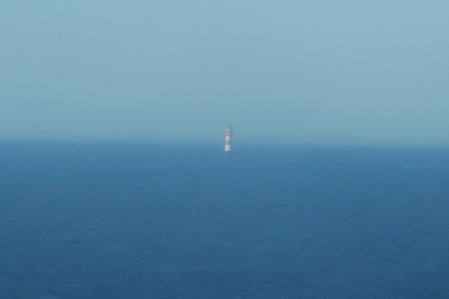 Sisli bir havada deniz feneri (Almanya - Bremen aklar) [Zafer Kesman]